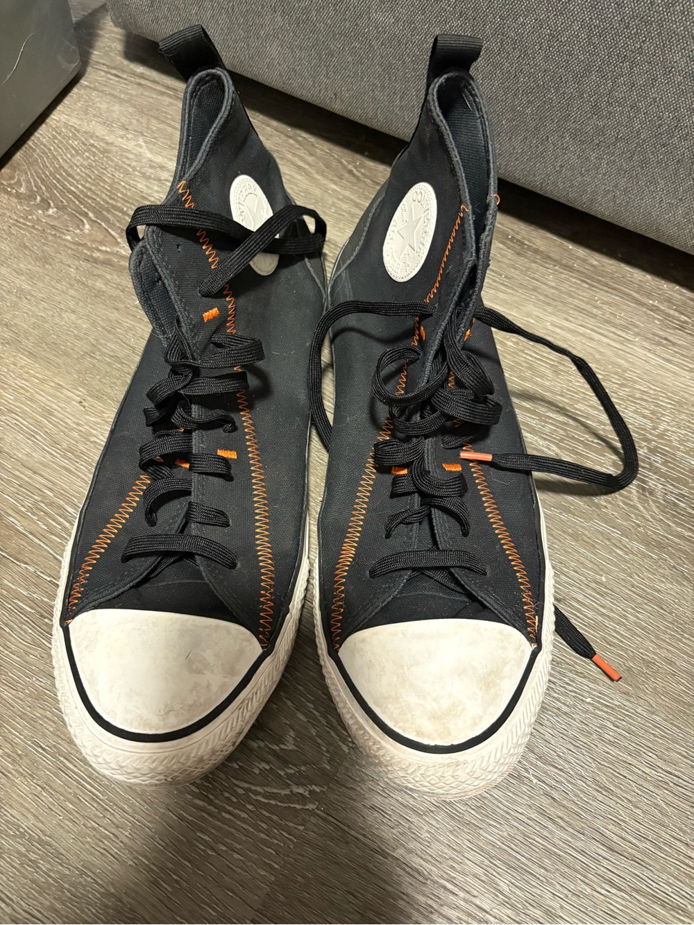 Converse Black High-Top Sneakers with Orange Stitching